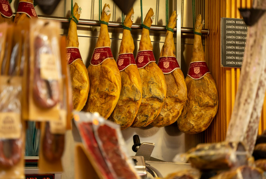 Wat is de beste Spaanse ham en hoe serveer je deze?